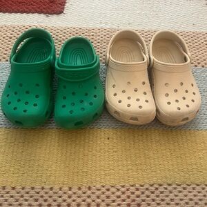 2 pairs of crocs